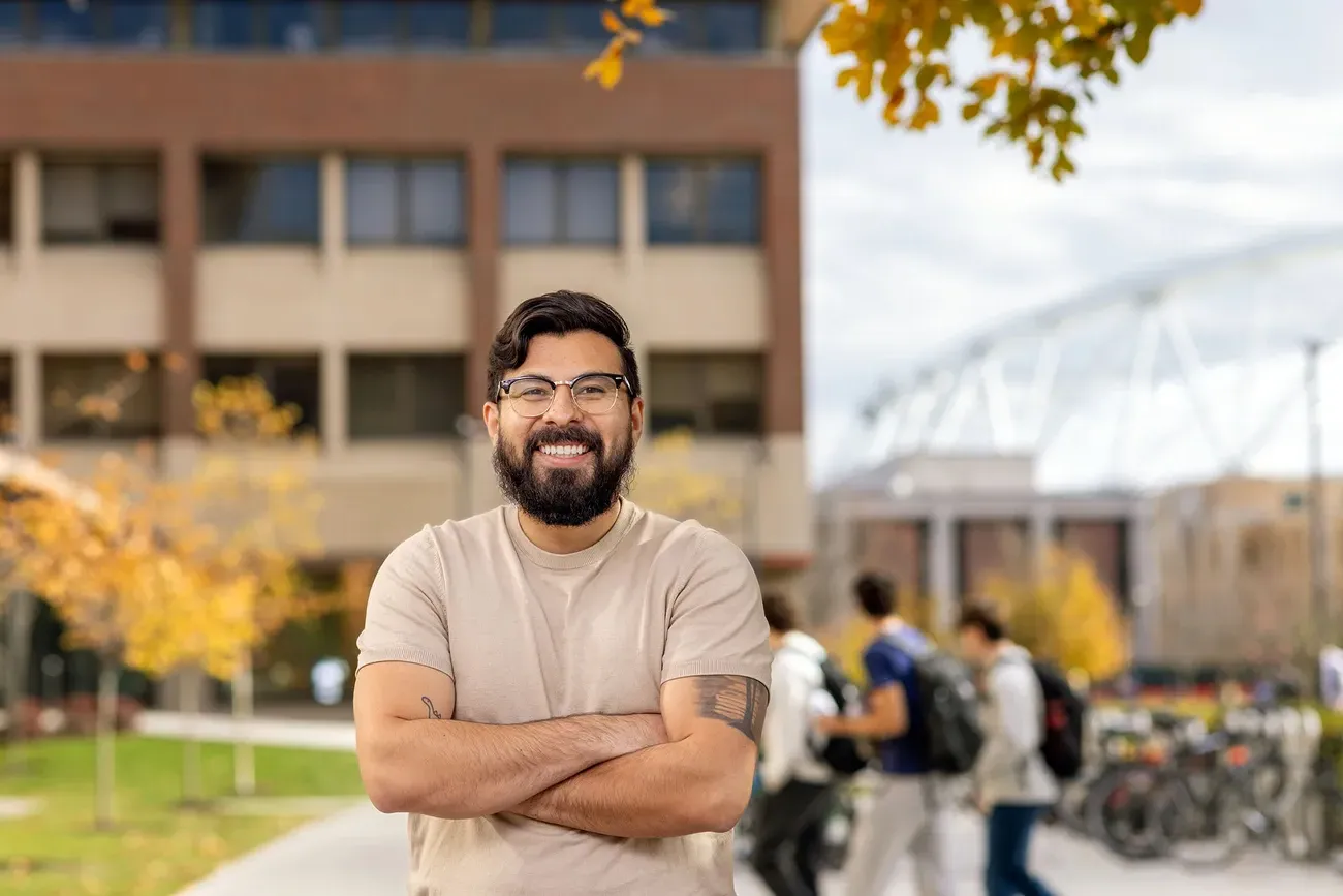 Jurgen Baeza Bernal smiling in front of the dome.